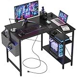 TIQLAB Small L Shaped Computer Gaming Corner Desk with Power Outlets, Reversible Shelves for Study, Writing Table for Home, Office, Bedroom, Living Room, 40 inches, Black
